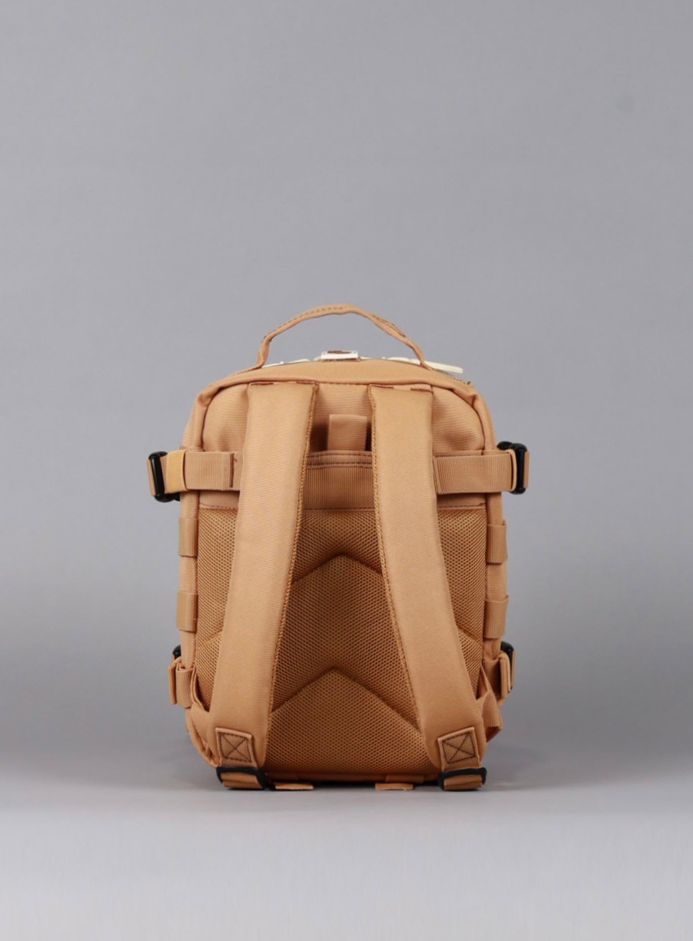 An image featuring the back view of the 9L Backpack Mini Bombshell Sportswear in Caramel color