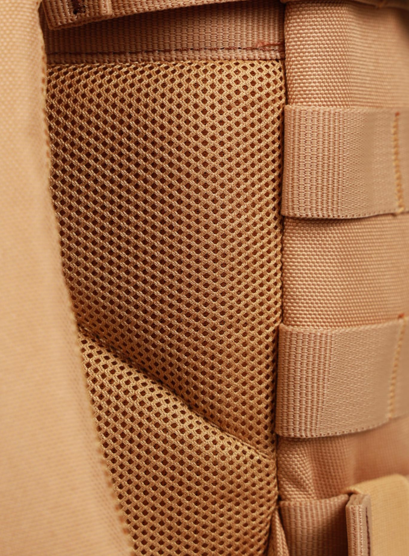 A picture showing the back padding on the the 9L Backpack Mini Bombshell Sportswear in Caramel color