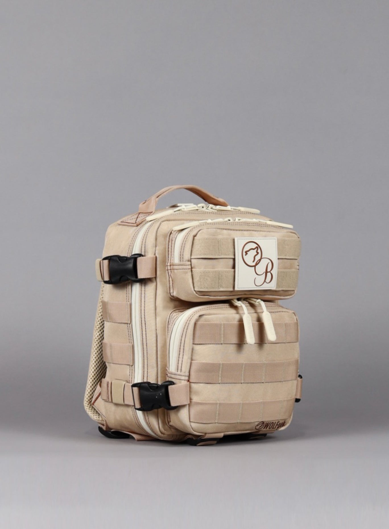 left side view of the 9L Backpack Mini Bombshell Sportswear Latte