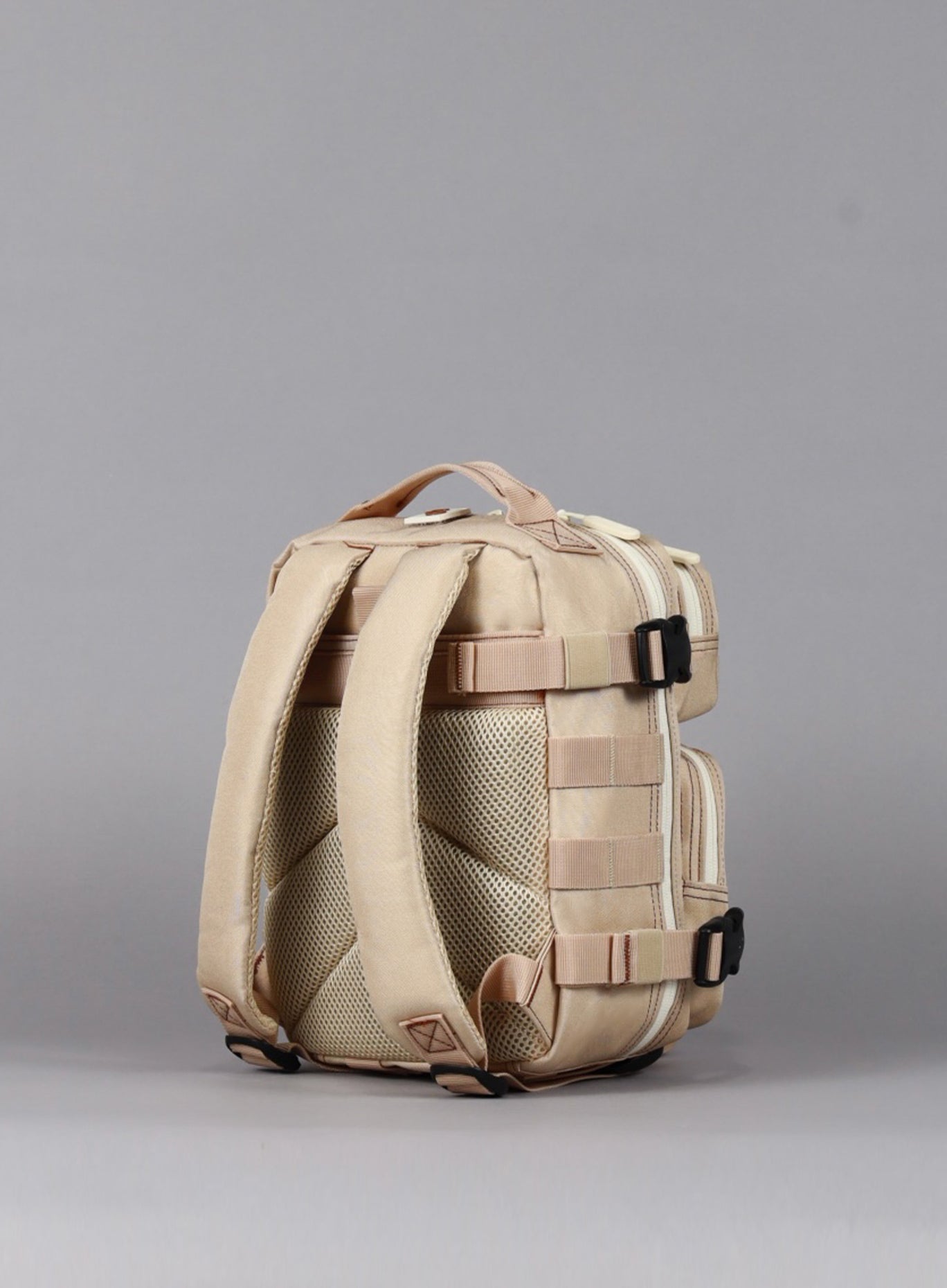 a picture showing the back view of the 9L Backpack Mini Bombshell Sportswear Latte