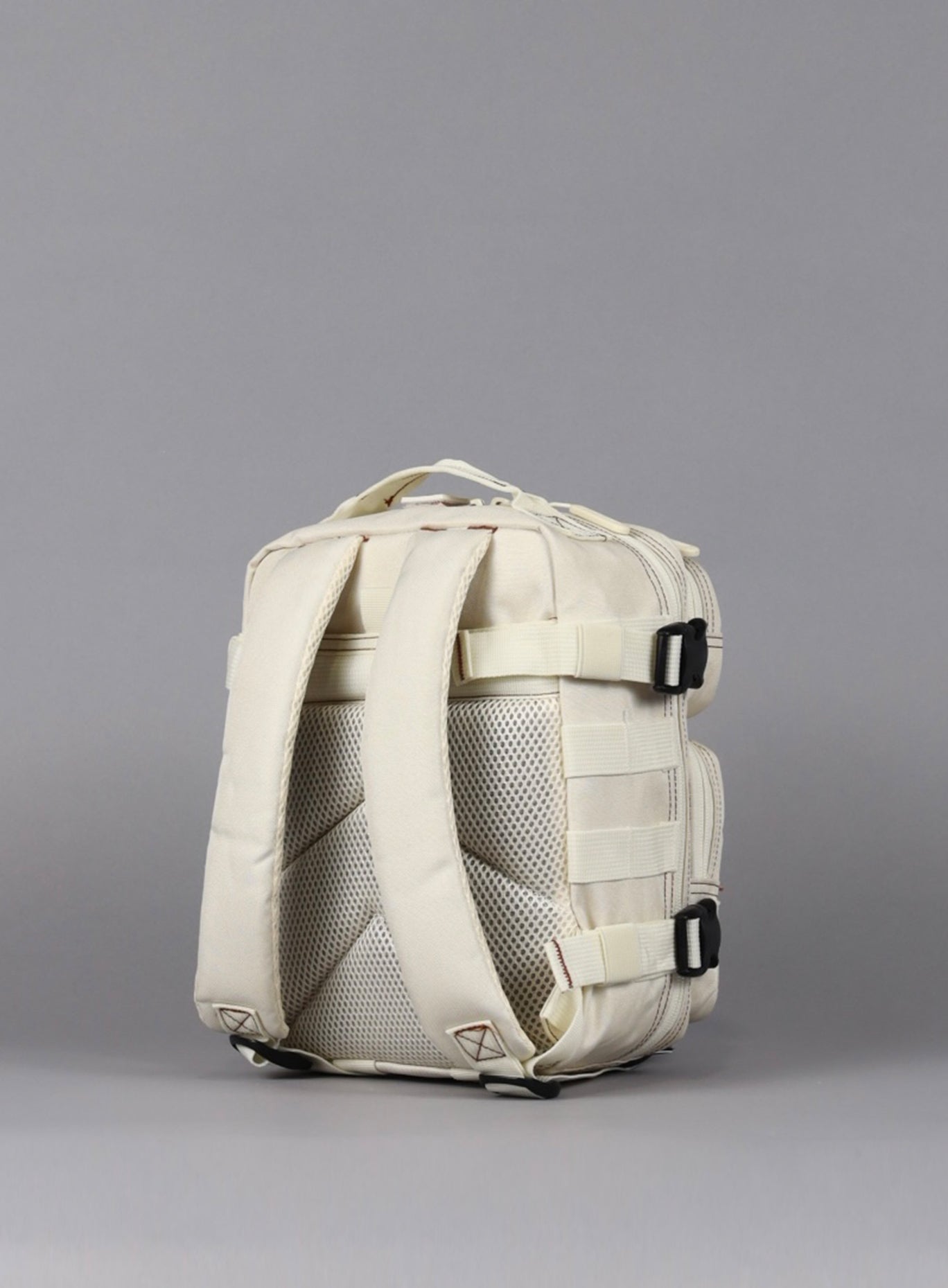 back view of the 9L Backpack Mini Bombshell Sportswear in Crème color