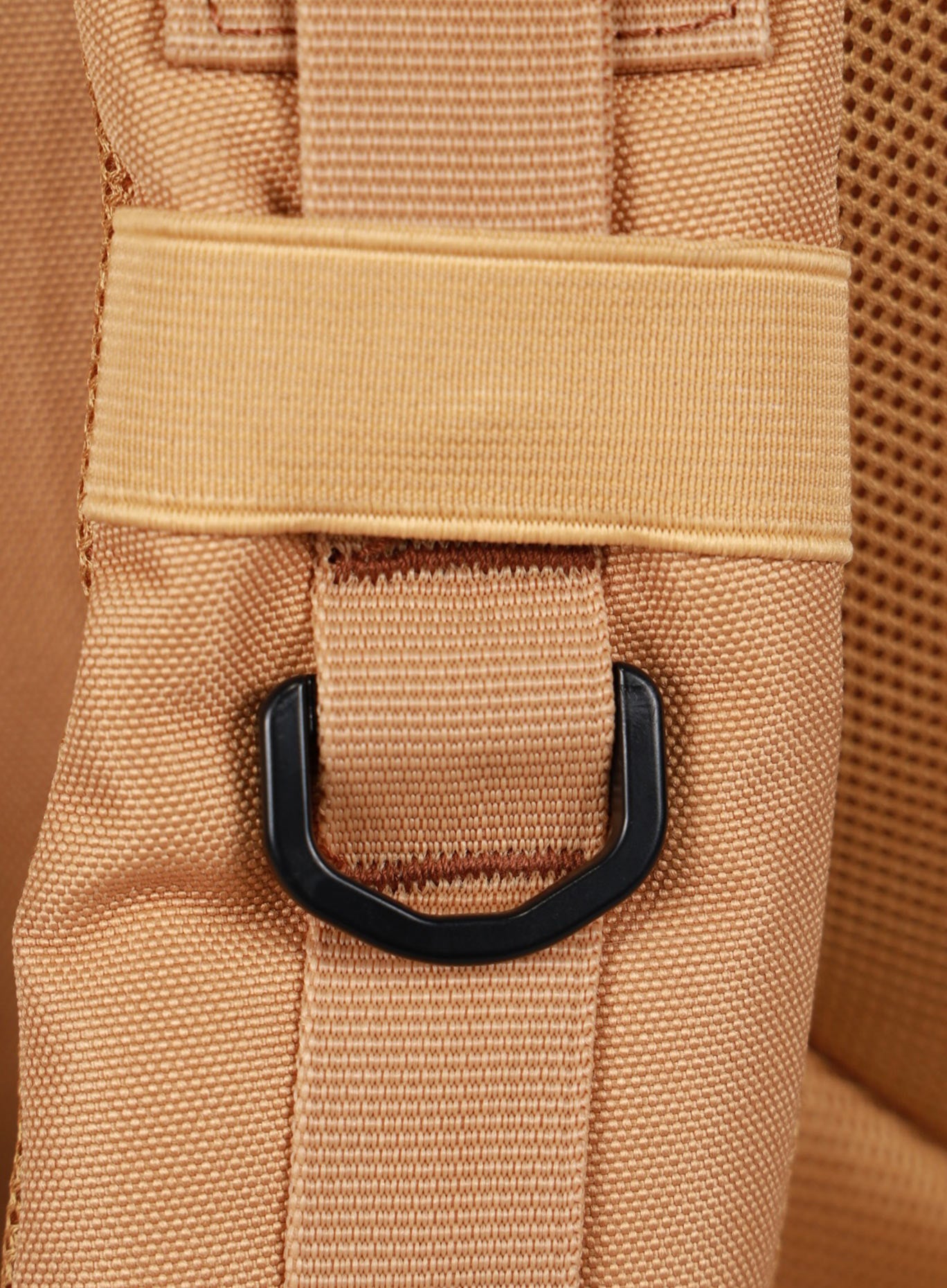 close up picture of the shoulder strap on the   25L Backpack Bombshell Sportswear in Caramel color
