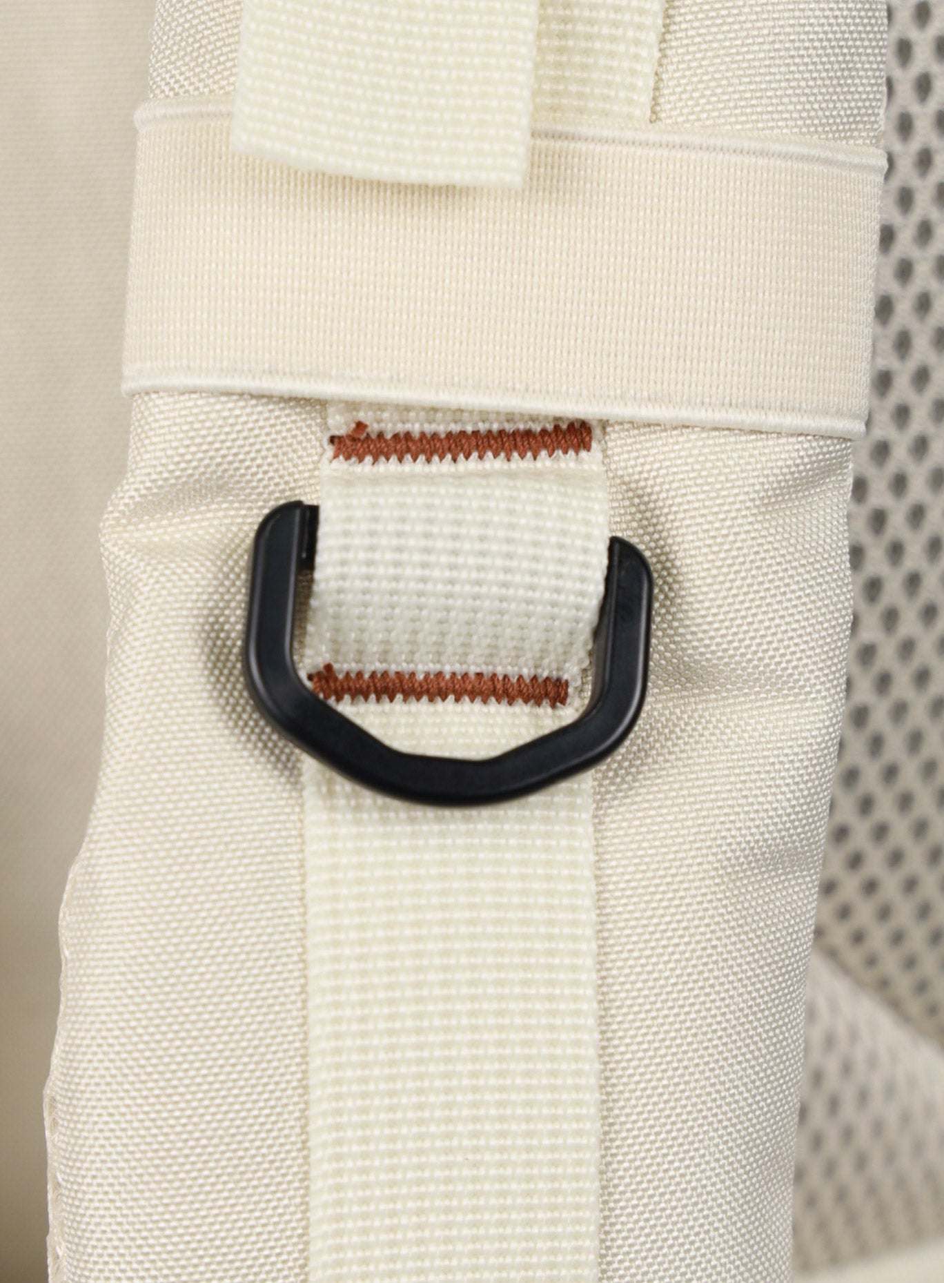 close up picture of the shoulder strap on the   25L Backpack Bombshell Sportswear in Crème color