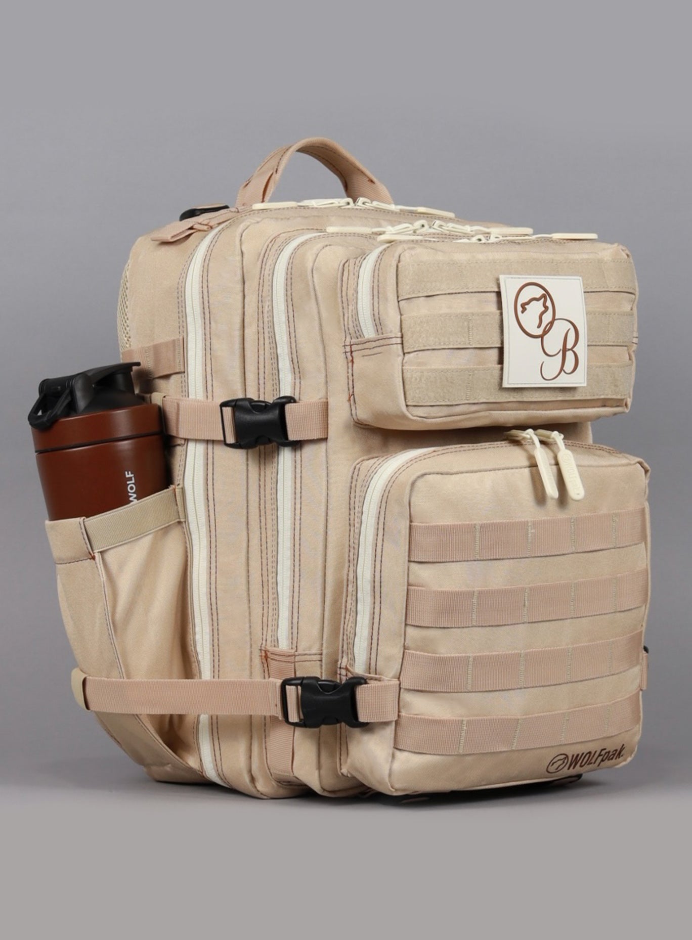 A photo depicting the side angle of the 35L Bombshell Sportswear backpack in Latte color