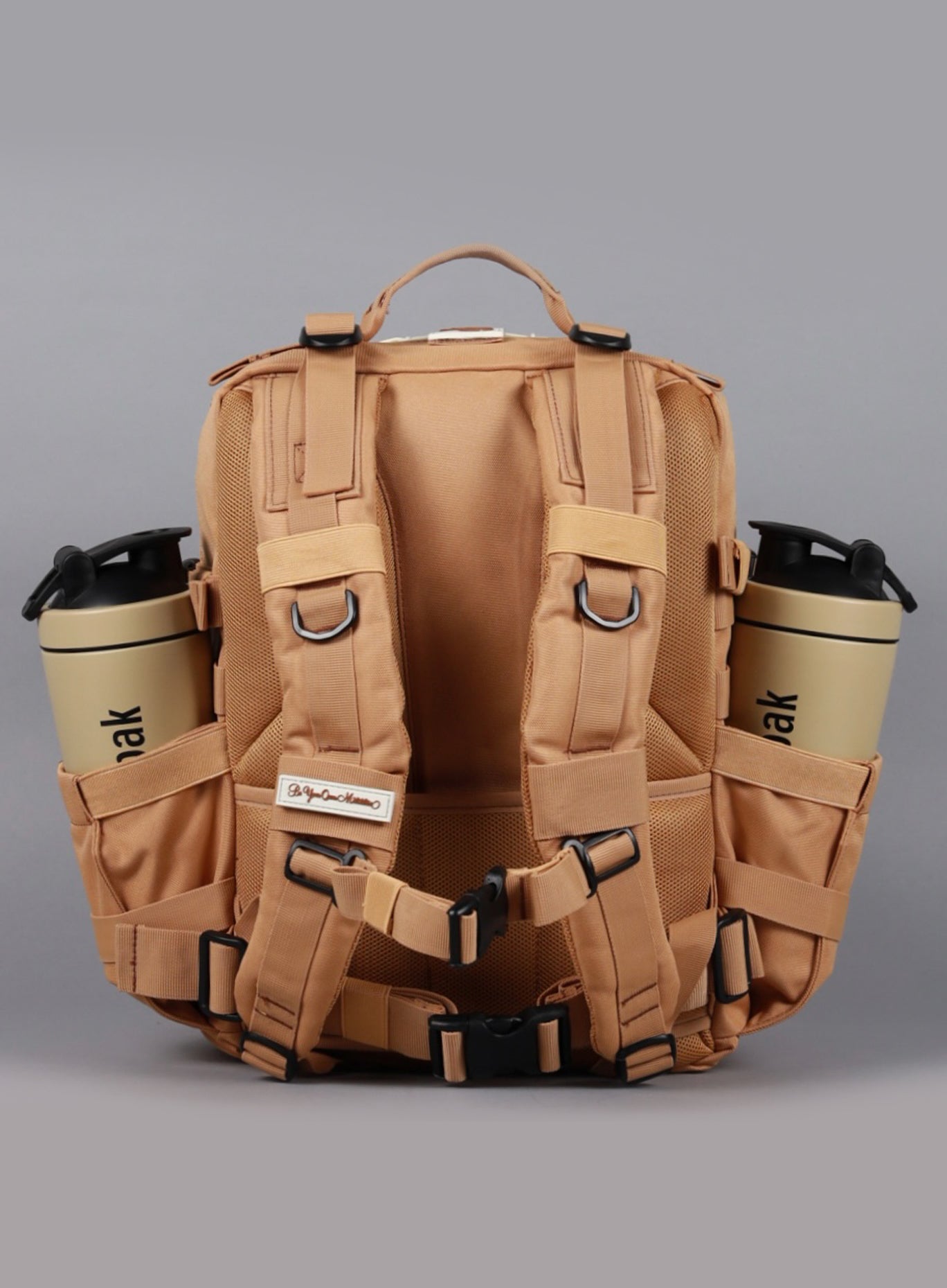 A rear perspective of the  25L Backpack Bombshell Sportswear in Caramel color
