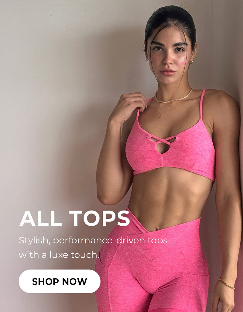 A fit model with dark hair wears spaghetti strapped bright pink sports bra with matching v-Cut leggings. The text overlay reads 'ALL TOPS – Stylish, performance-driven tops with a luxe touch,' accompanied by a 'Shop Now' call-to-action button below.