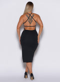 back  profile view of a model wearing our black bombshell bunny dress