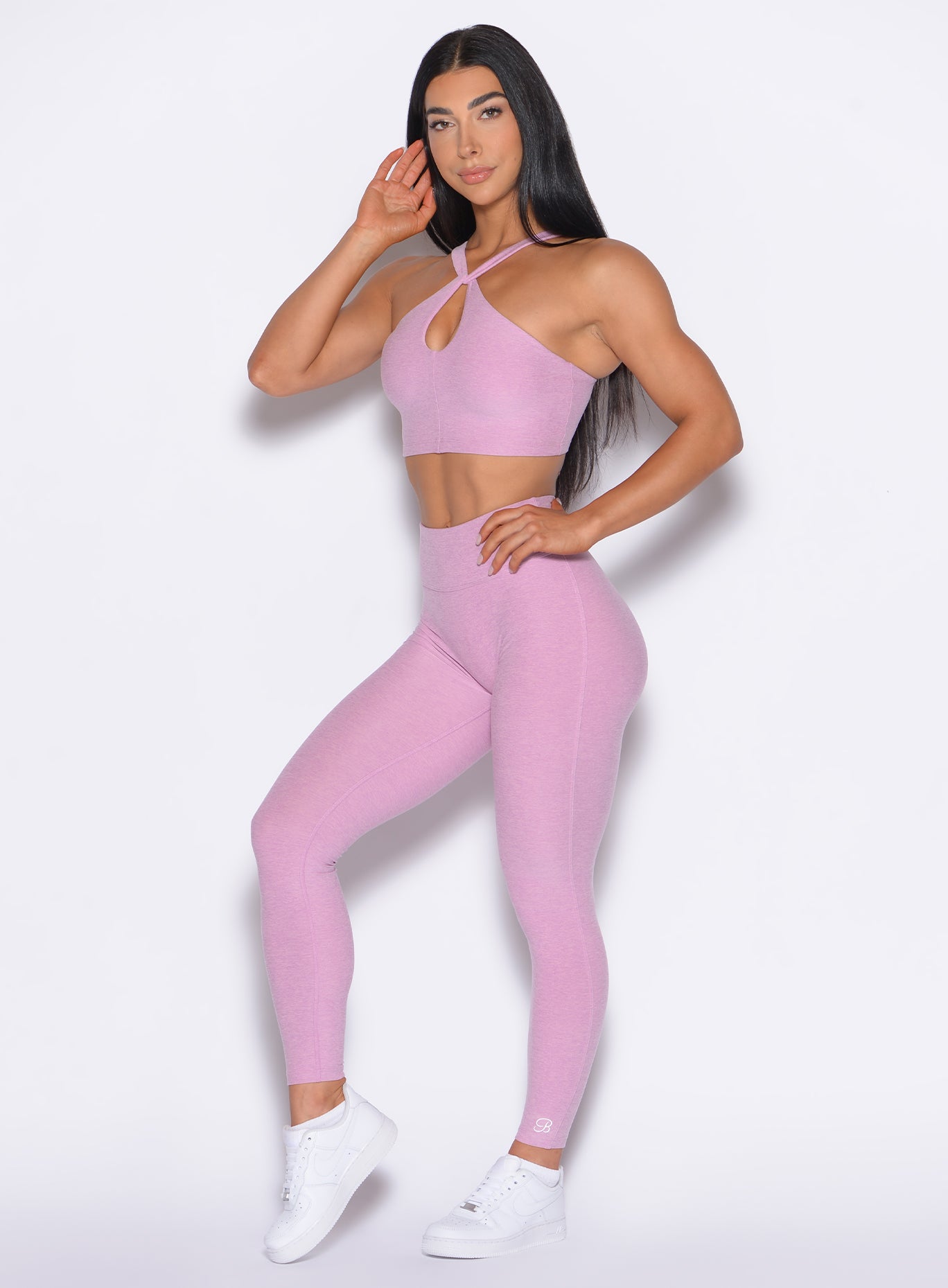 front left side profile view of our model wearing the Bombshell Bunny Leggings in fondandt color