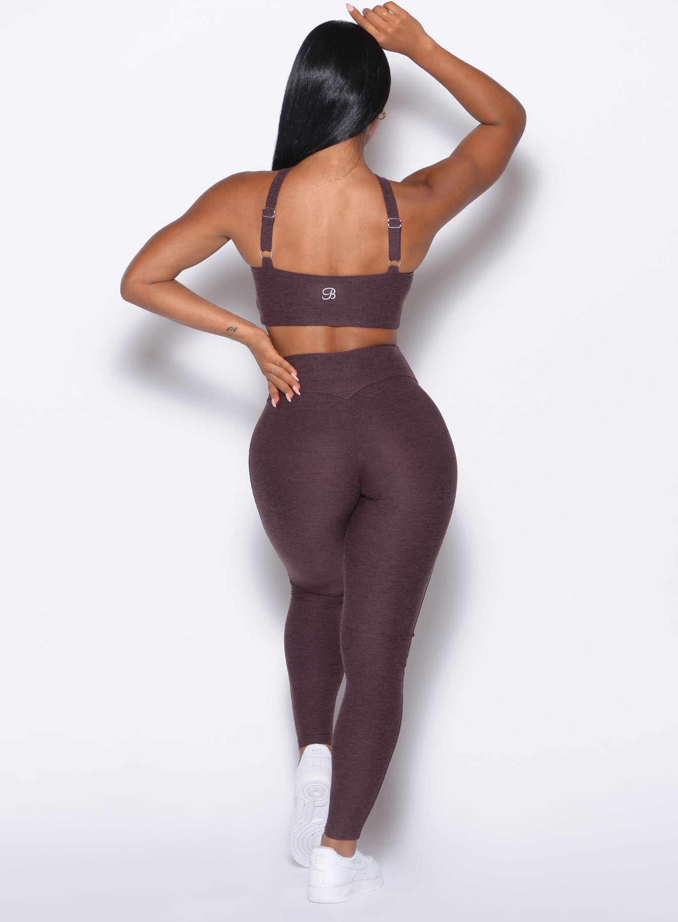 back profile view of our model wearing the Bombshell Bunny Leggings in peppercorn color