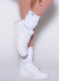 right side view of white bombshell scrunch socks 