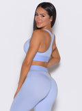 back left side profile view of our model wearing the Bombshell Active Bra in Baby Lavender color