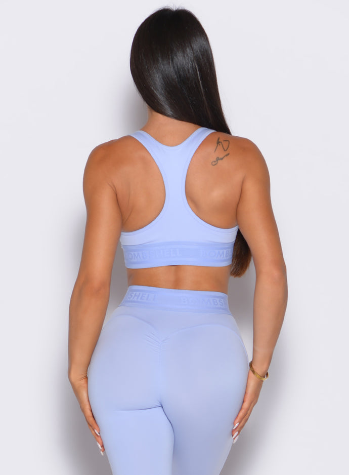 back profile view of our model wearing the Bombshell Active Bra in Baby Lavender color