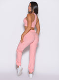 back left side profile view of a model wearing the Cloud Comfort Joggers in Peachy pink color