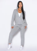 front profile view of a mode wearing the Cuddle Up Joggers in Cozy Silver color paired with the matching hoodie