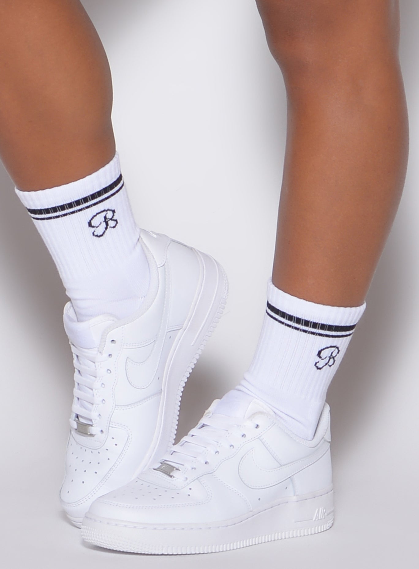 zoomed in front view of Bombshell Sportswear white crew socks 