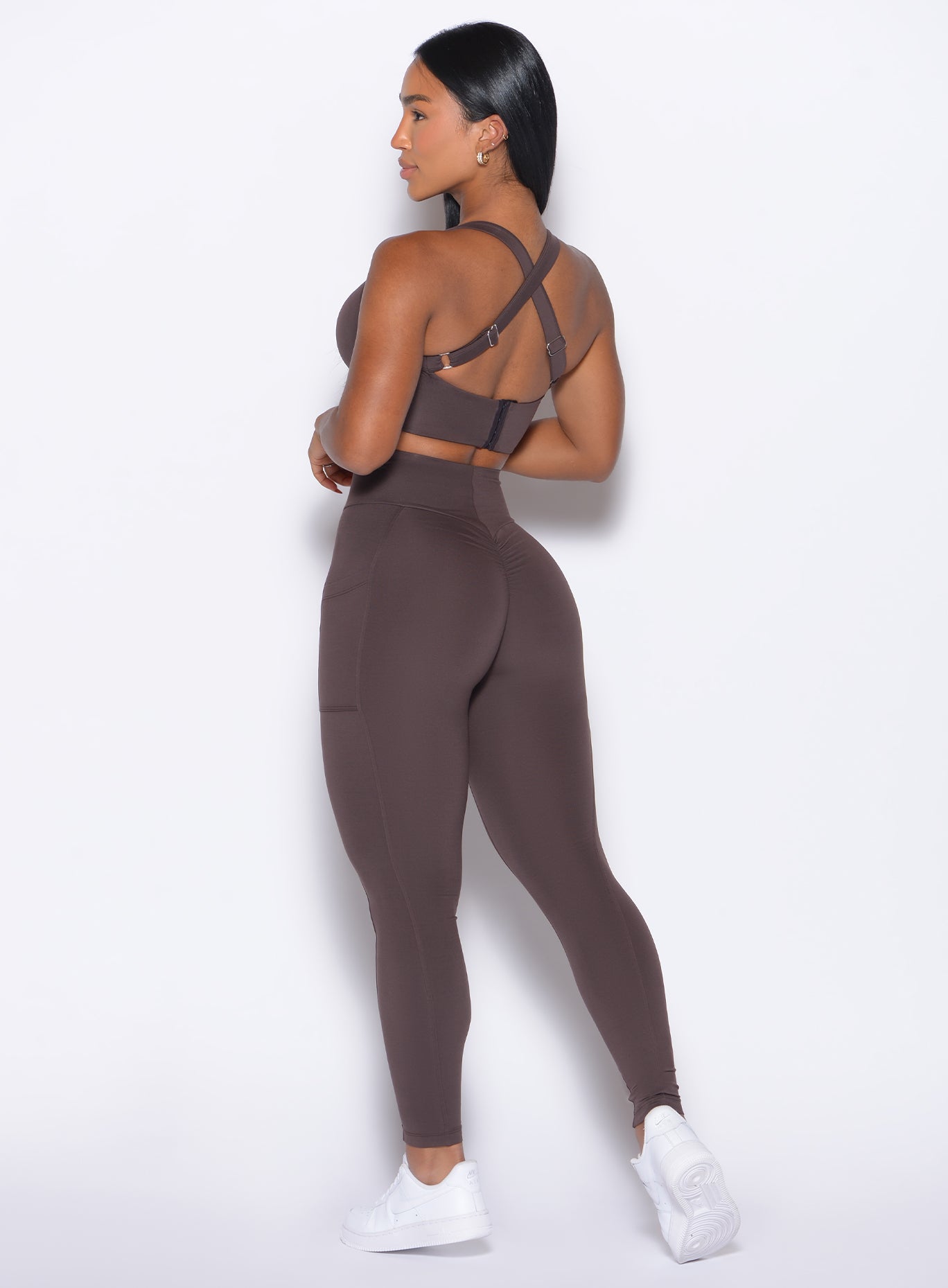 back left side profile view of our model wearing the Curves 2.0 Leggings in Seal Brown color