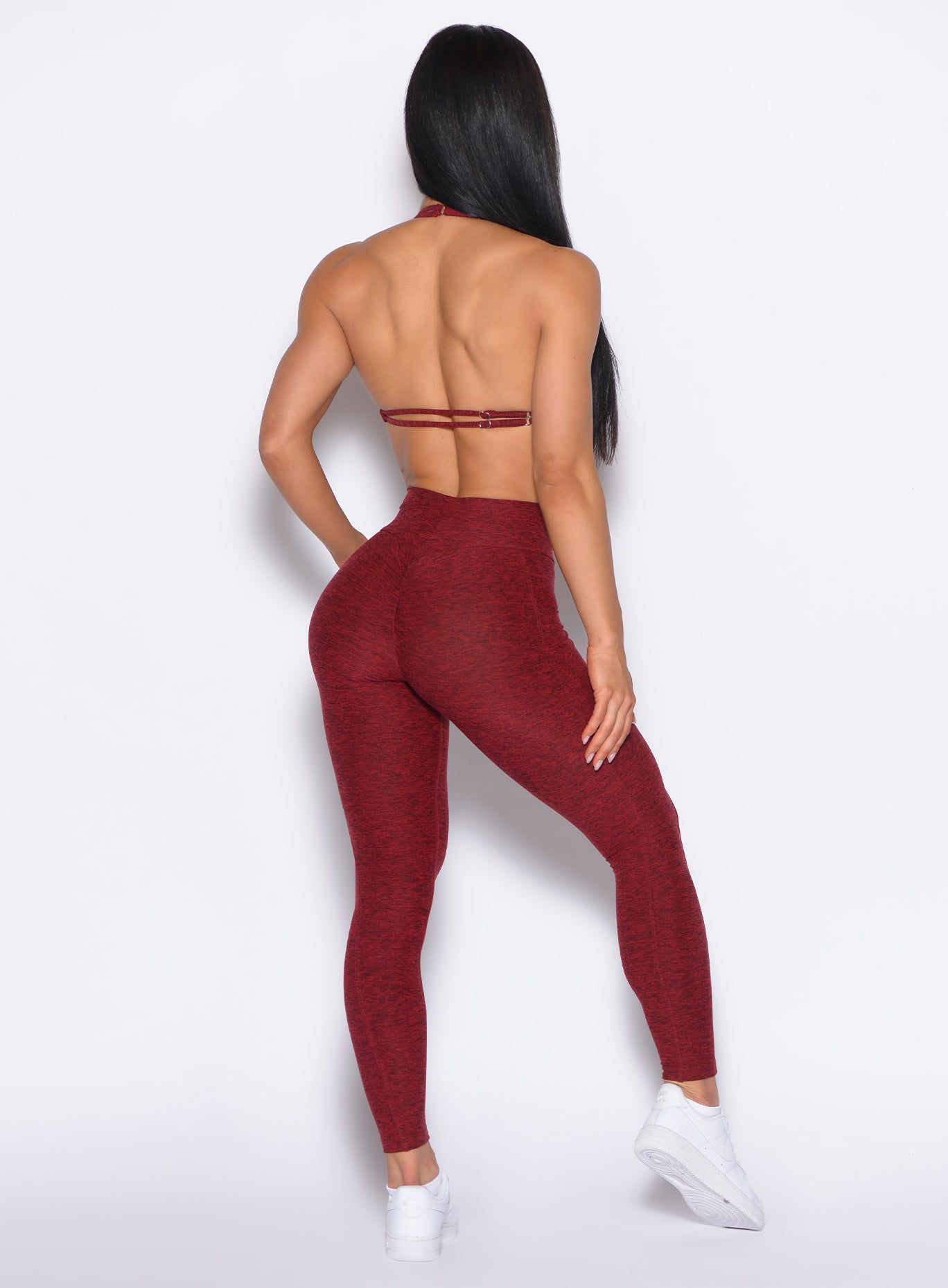 back profile view of our model wearing the Curves 2.0 Leggings in Black Cherry color