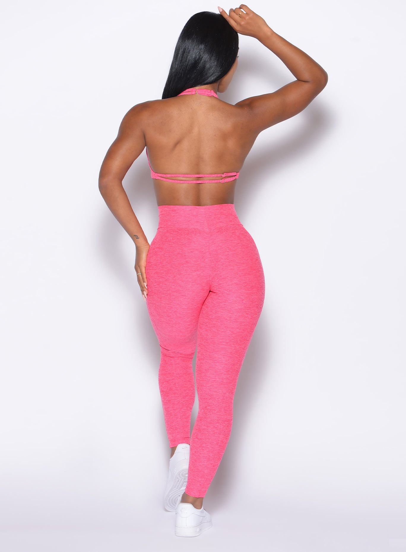 back profile view of our model wearing the Curves 2.0 Leggings in Neon Flame color