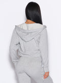 back profile view of our model wearing the Sweat Hoodie in Light heather grey color