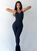 Front profile picture of a model wearing our black laced bodysuit 