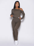 front profile view of a model wearing the Luxe Leg Warmers in Winter oak color paired with the matching top and bottom