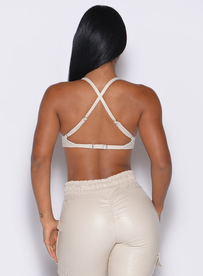 back profile view of our model wearing the Liquid Kini Bra in champagne color