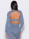 back profile view of our model wearing the Bombshell Active Pullover in Flinstone color