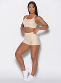 Front profile view of our model looking to the left wearing our Cloud Comfort Shorts in vanilla color