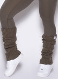 left side close up view of a model wearing the Luxe Leg Warmers in Winter oak color 