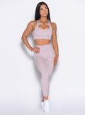 front profile view of a model wearing our Pocket Pop Leggings 2.0 in Violet Ice color and the matching bra
