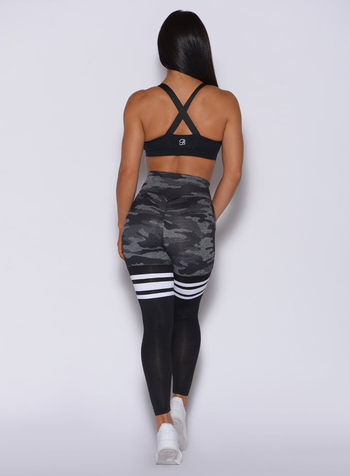 back profile view of a model wearing our Scrunch Thigh High Gray/Black Camo