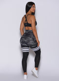 Right side view of model wearing our Scrunch Thigh High Gray/Black Camo 