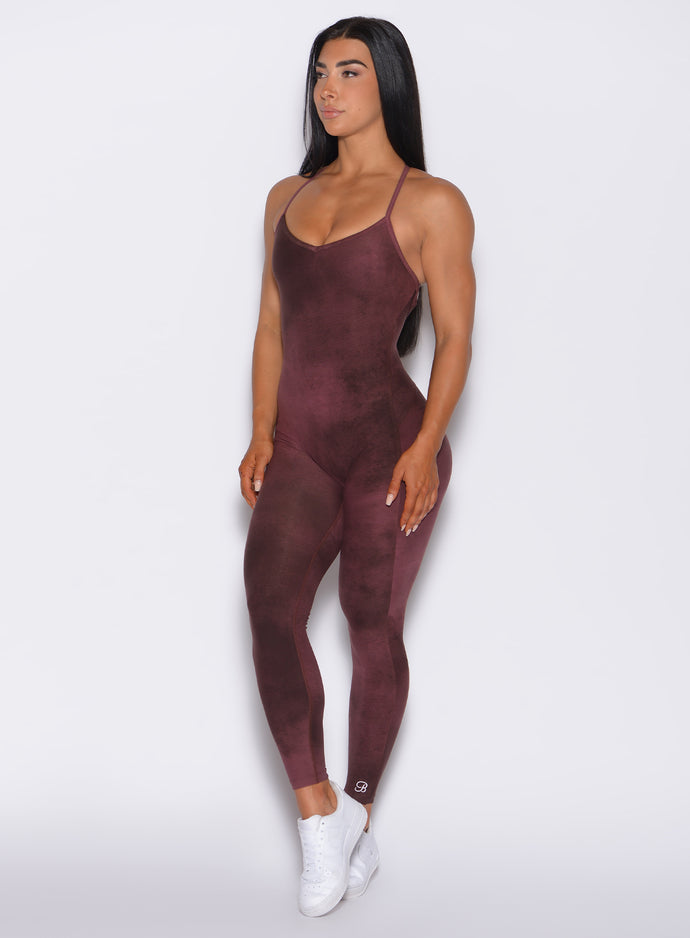 Front profile view of a model in our Sculpt Bodysuit in Vintage Port color