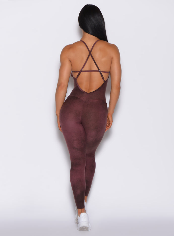 Back profile view of a model in our Sculpt Bodysuit in Vintage Port color 