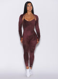 Front profile view of a model in our Sculpt Bodysuit in Vintage Port color along with the matching shape shrug