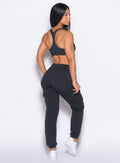 back right side profile view of our model wearing the Sweat Joggers in Vintage Black color