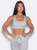 front profile view of our model wearing the Sweat Lounge Bra in Light Heather Grey color