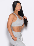 front right side profile view of our model wearing the Sweat Lounge Bra in Light Heather Grey color