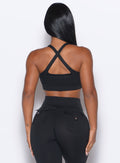 back profile view of our model wearing the Two Way Bra in Black color