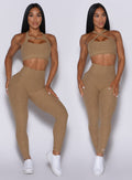 two front profile pictures of a model wearing our pocket pop leggings in caramel color and a two way bra 