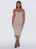 front profile view of a model in our unforgettable dress in camel color