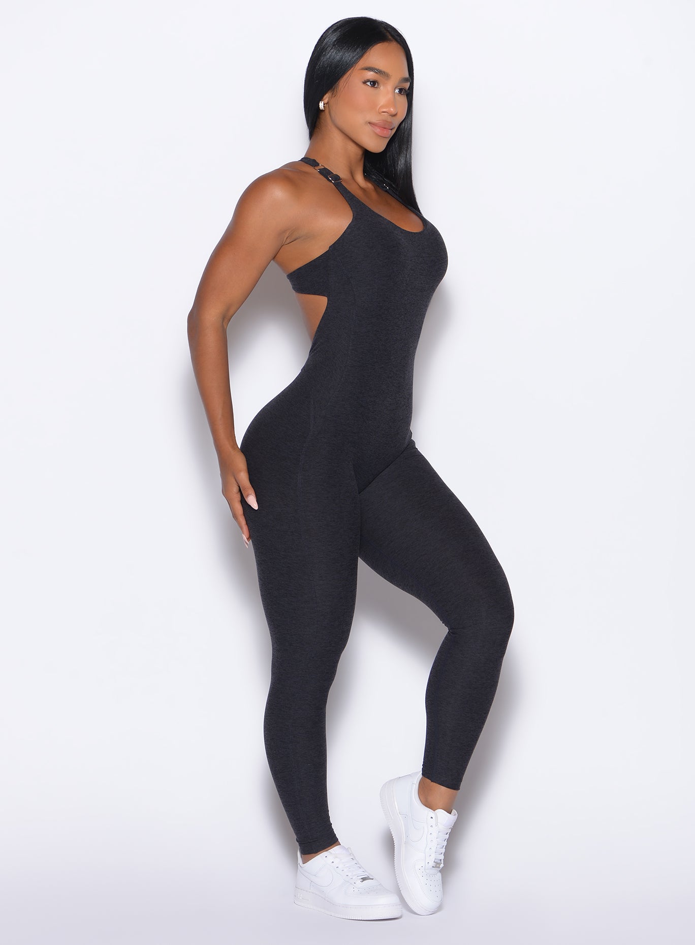 right side profile view of our model wearing the Athletic Bodysuit in Onyx color